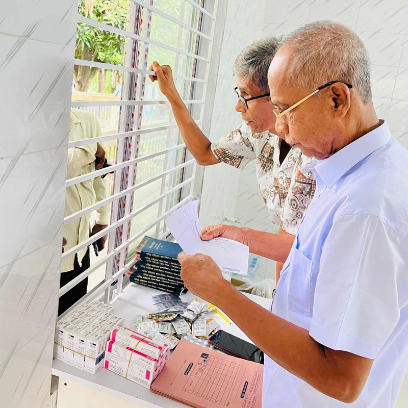ENT Doctor sharing the Gospel and handing out Bibles to patients.
